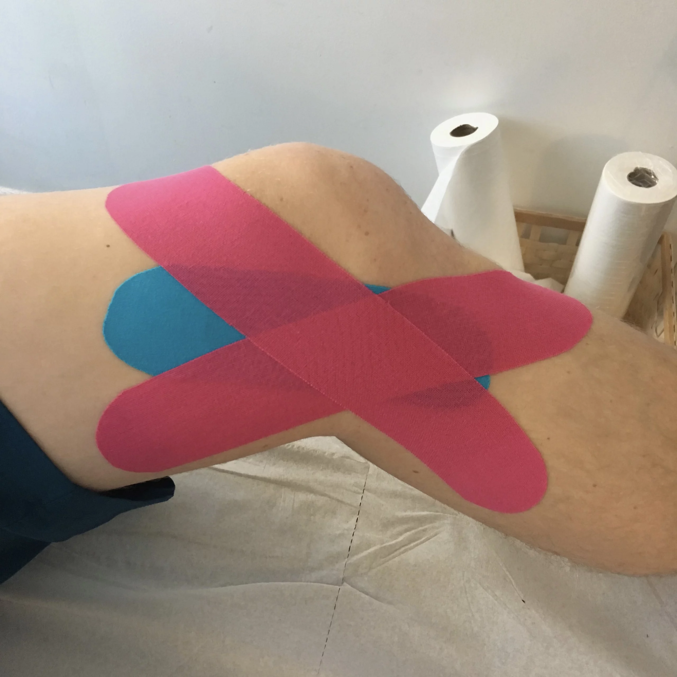 kinesiology tape on a knee
